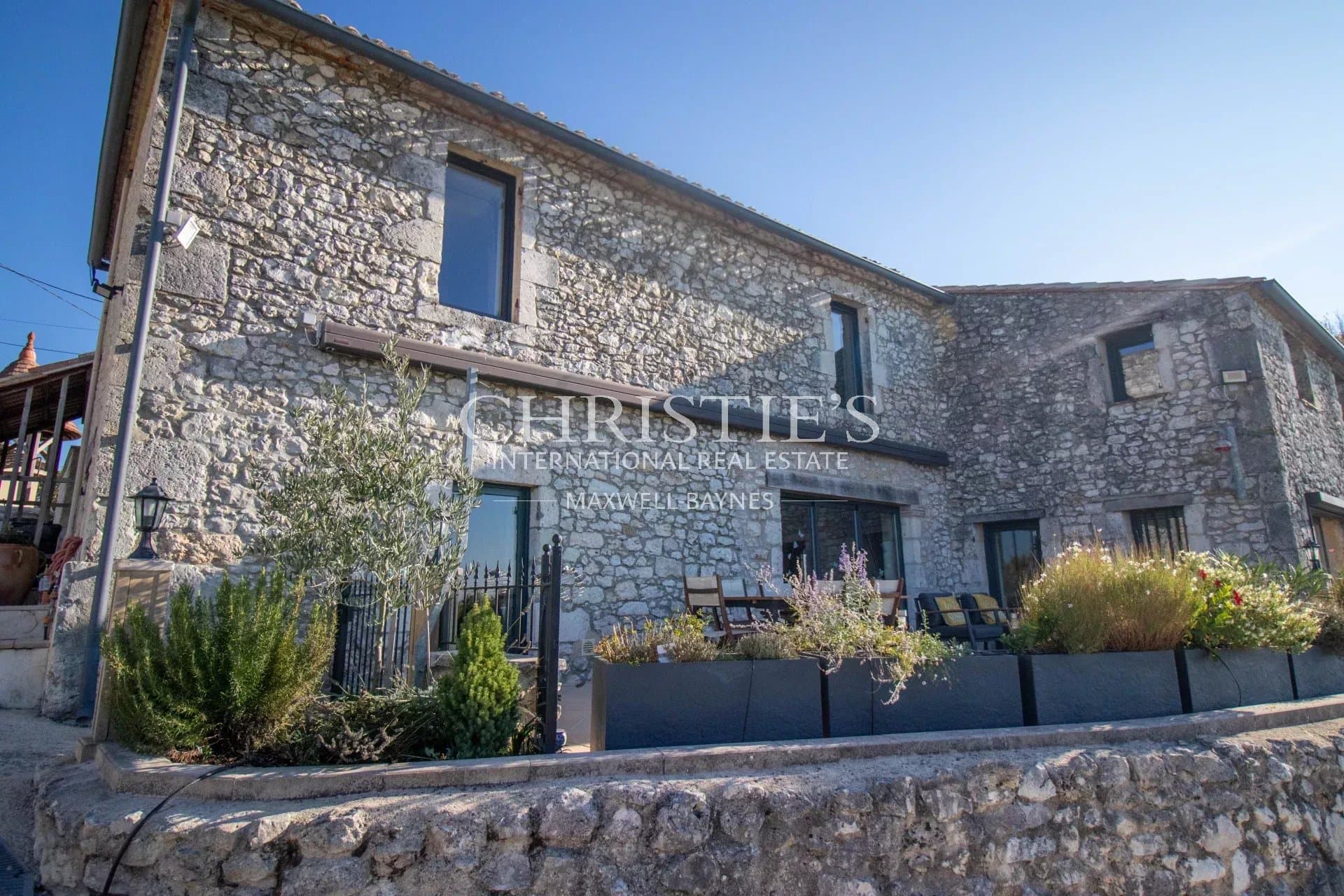 The Mill House, perched atop a hill, offers stunning and panoramic views