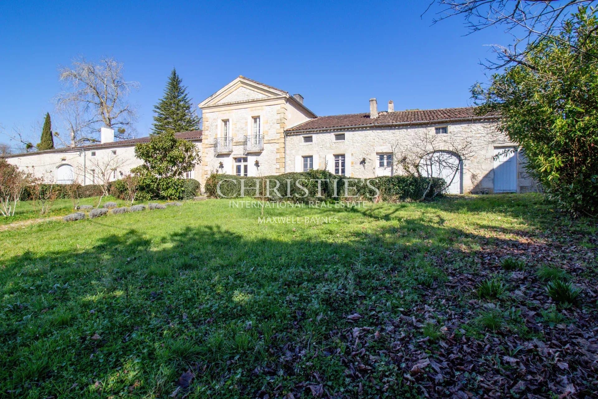 Stunning country manor house featuring beautiful gardens, a heated pool, and breathtaking views