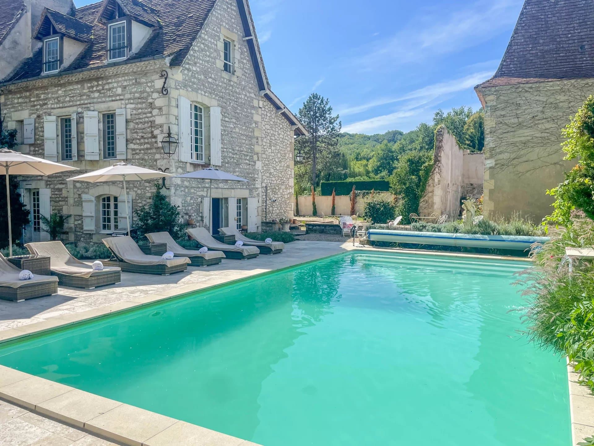 The Woodland Stone Manor House, nestled in a peaceful hamlet alongside the scenic River Dordogne